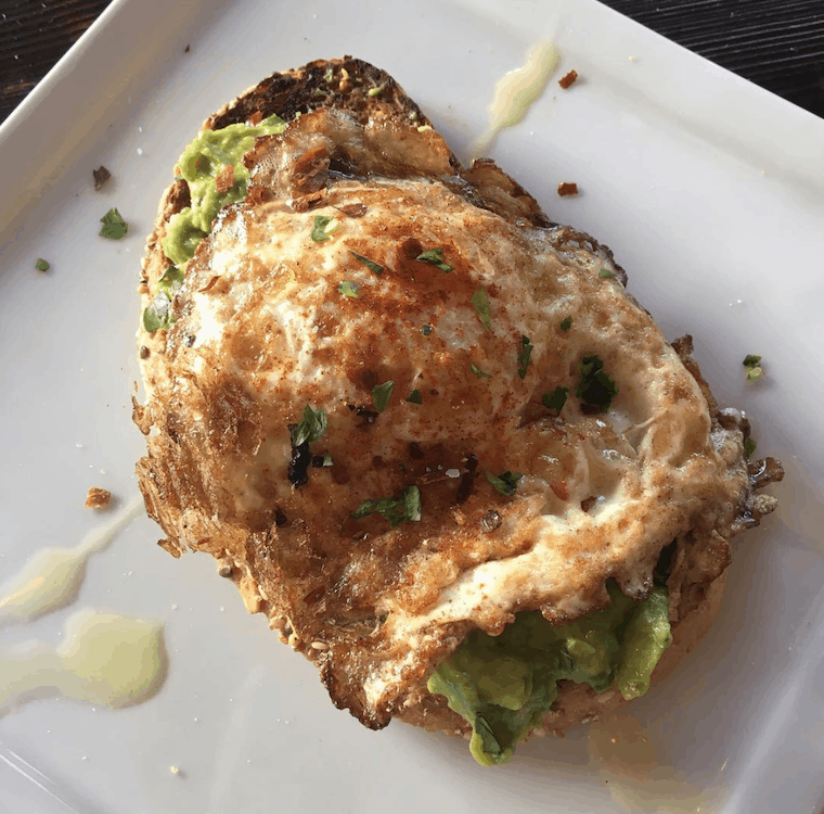 fried egg on avocado toast from Rustic Kitchen