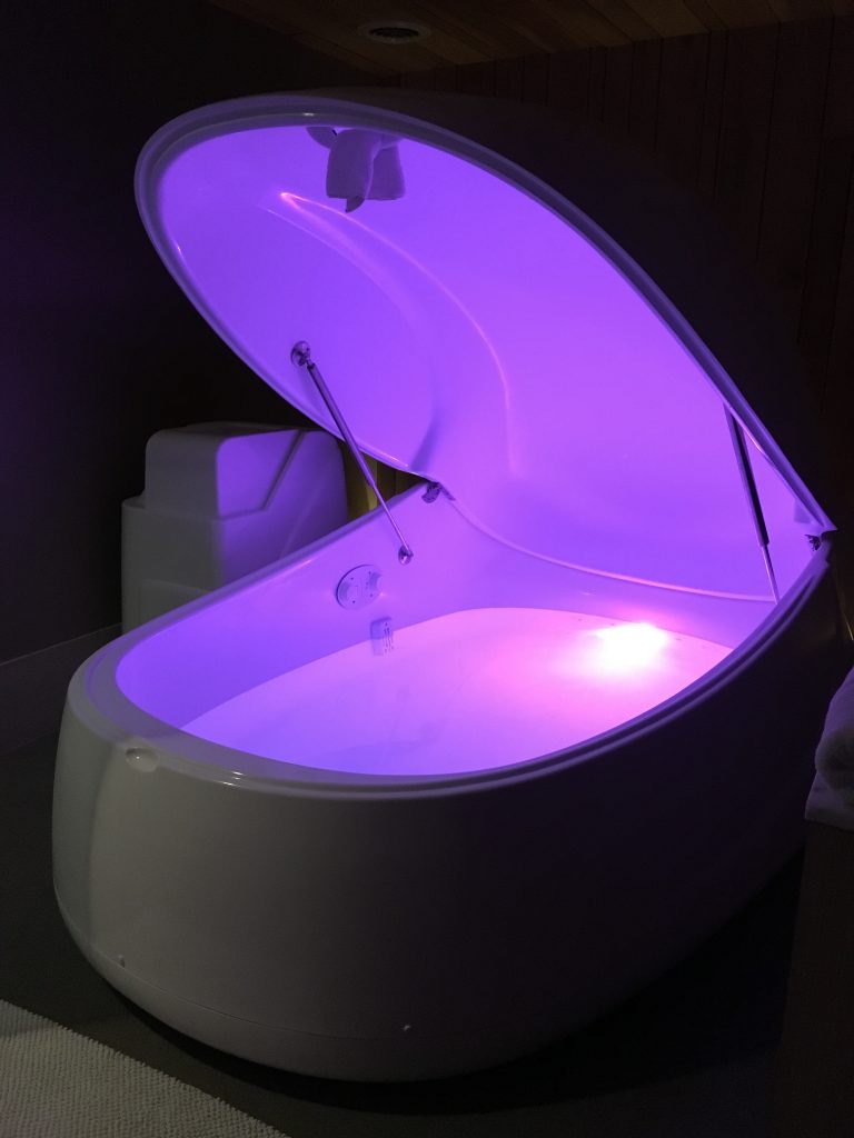 glowing pod at Pause Float Studio